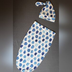 Newborn swaddle with hat.